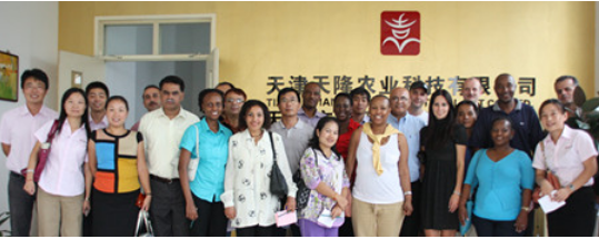 Government officials from developing countries come to visit the company